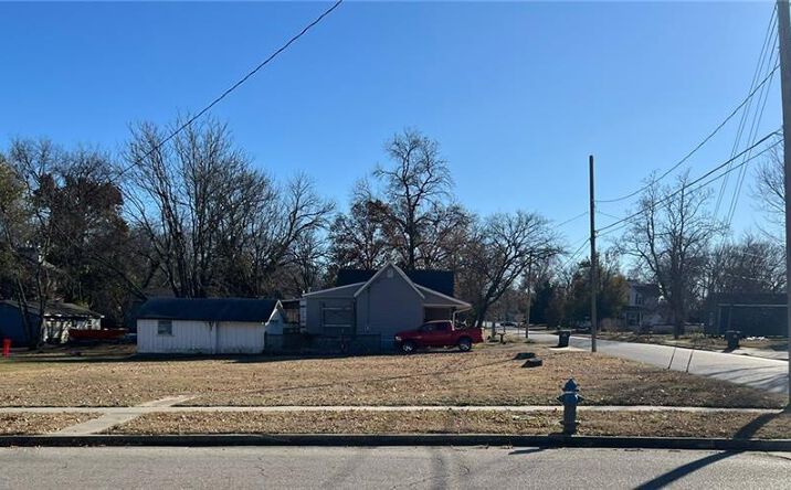 Pictures of Land, Multifamily property located at 122-124 N Spring Street, Nevada, MO 64772 for sales - image #1