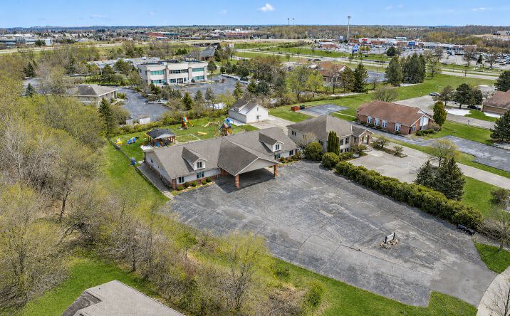 Pictures of Retail, Office, Mixed Use property located at 1701 Vogt Drive, West Bend, WI 53095 for sales - image #1