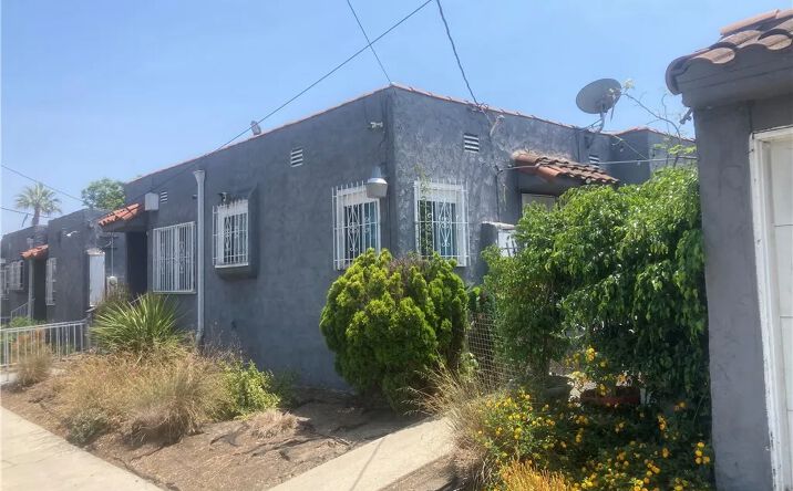 Pictures of Multifamily property located at 302 W 107th Street, Los Angeles, CA 90003 for sales - image #1
