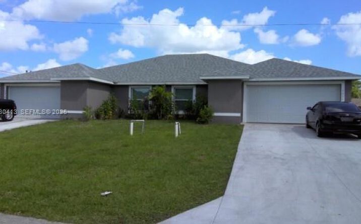 Pictures of Multifamily property located at 5016-5018 SW 24 ST, Lehigh Acres, FL 33973 for sales - image #1