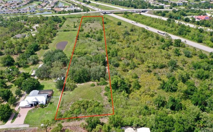 Pictures of Land property located at 24630 Tangelo Ave, Port Charlotte, FL 33980 for sales - image #1