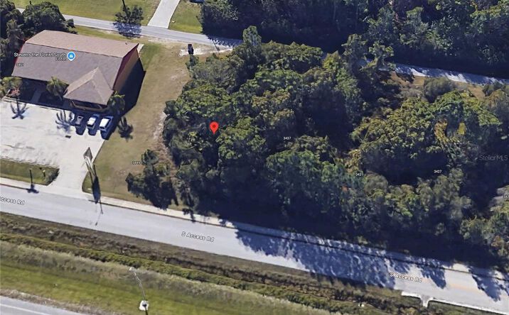 Pictures of Land property located at 3441 S Access Road, Englewood, FL 34224 for sales - image #1