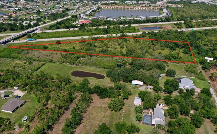 Pictures of Land property located at 24646 Tangelo Avenue, Port Charlotte, FL 33980 for sales - image #1