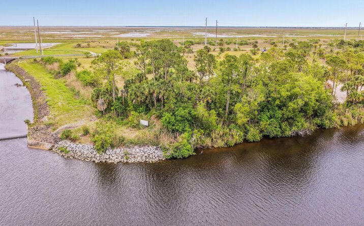 Pictures of Land property located at 00 SW Citrus Boulevard S, Palm City, FL 34990 for sales - image #1