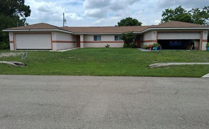 Pictures of Multifamily property located at 113 S John Ave Avenue S, Lehigh Acres, FL 33973 for sales - image #1