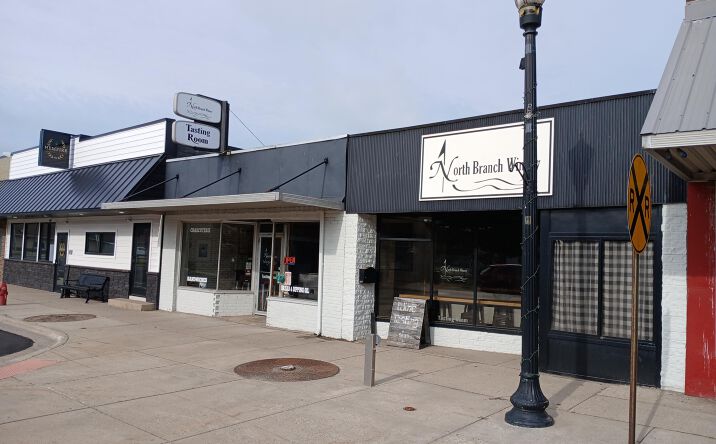 Pictures of Retail, Office property located at 126 & 128 S Main Street, Scottville, MI 49454 for sales - image #1