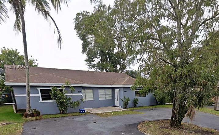 Pictures of Multifamily property located at 7318-7320 NW 76th Dr, Tamarac, FL 33321 for sales - image #1
