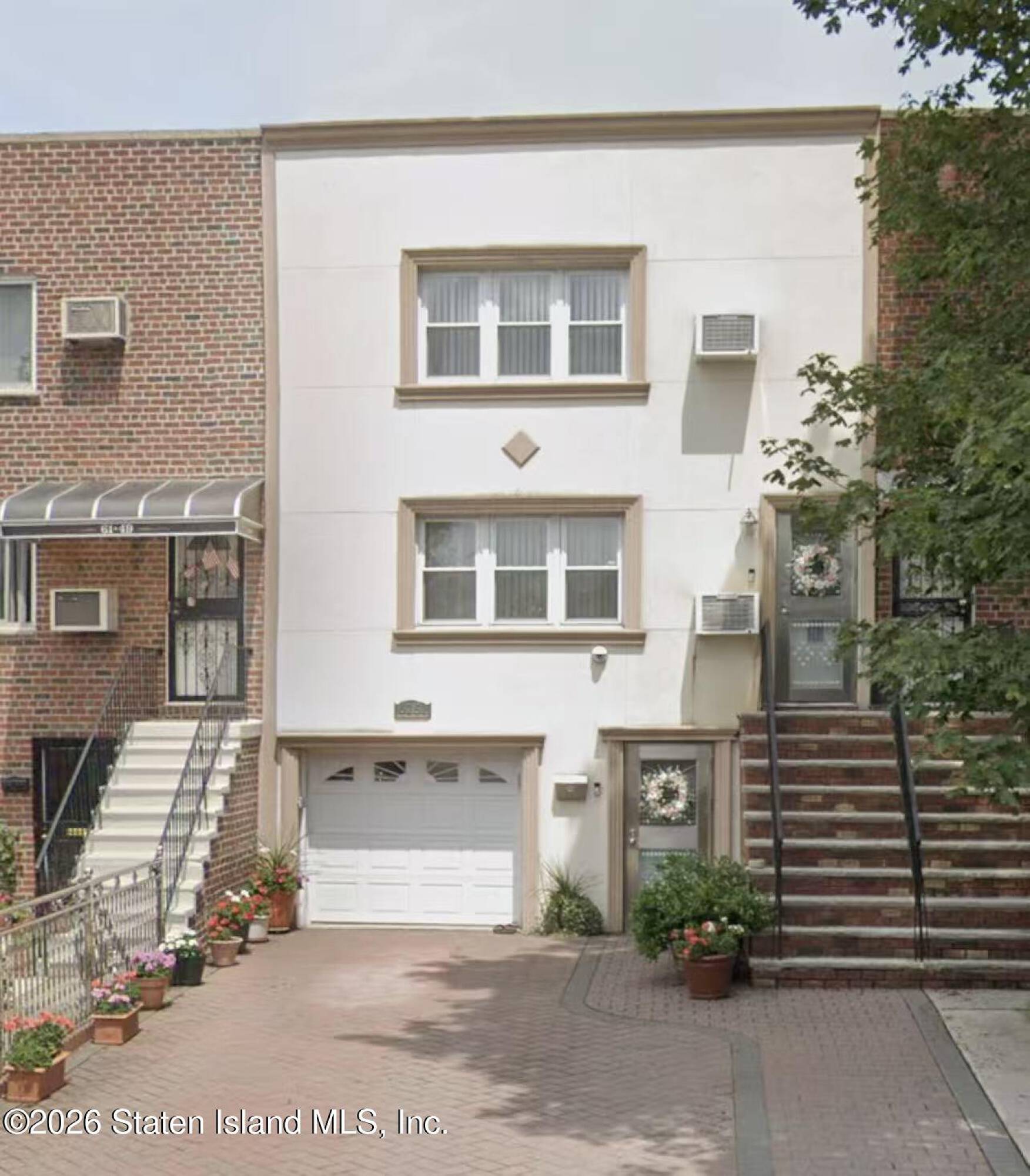 61-51 84th St  
