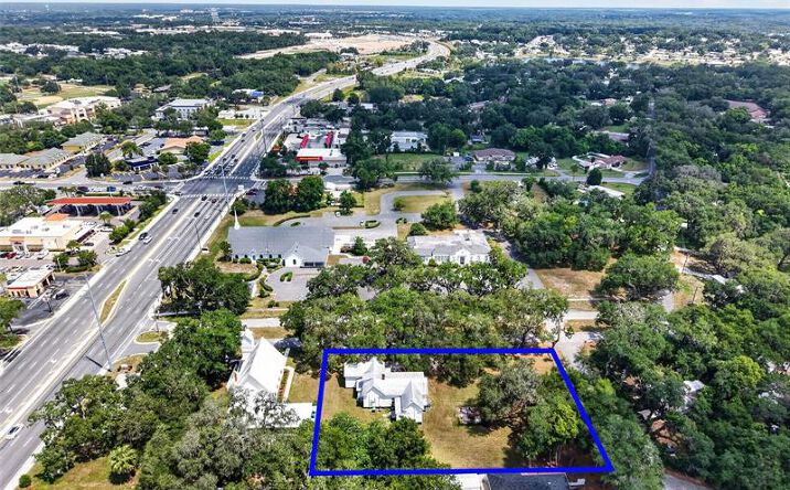 Pictures of Office, Mixed Use, Land property located at 112 W McClendon St, Lady Lake, FL 32159 for sales - image #1