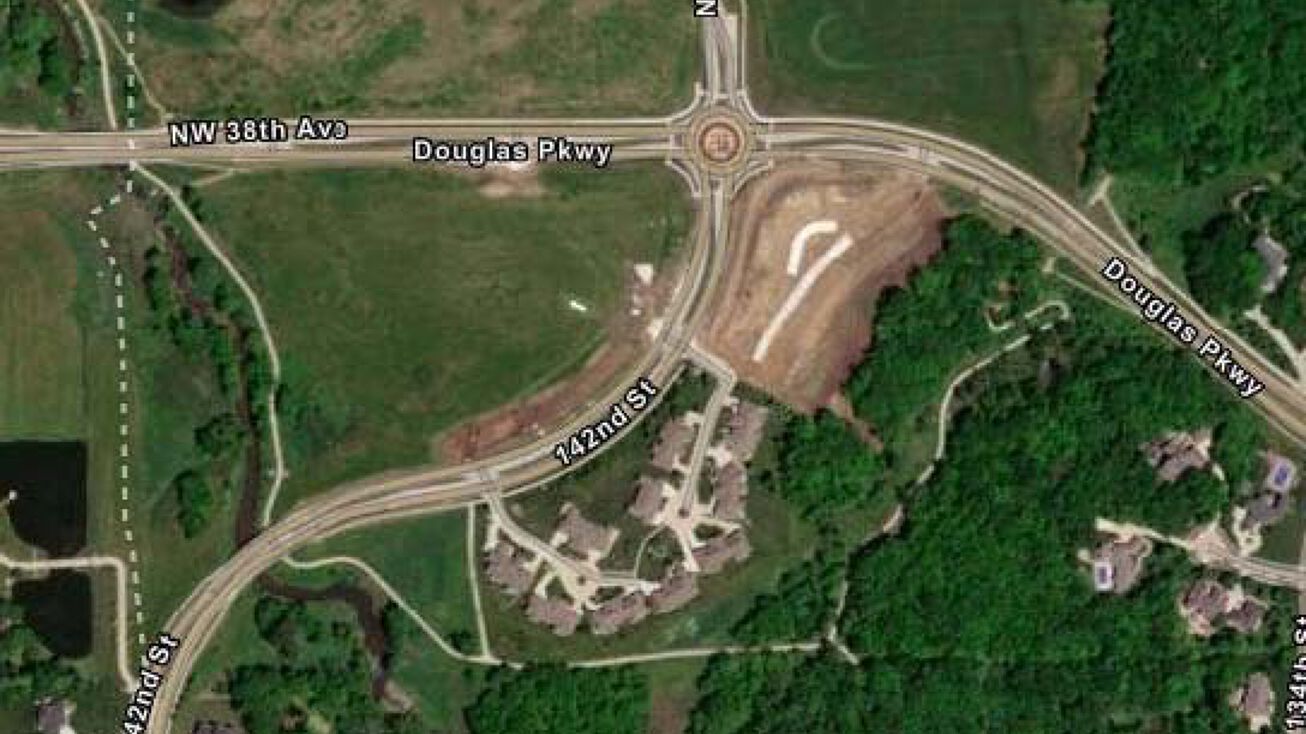 NE and SW quadrant of the roundabout at 142nd St & Douglas Pkwy