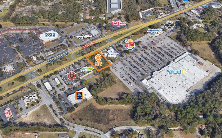 Pictures of Land property located at 4950 E Silver Springs Blvd, Ocala, FL 34470 for sales - image #1