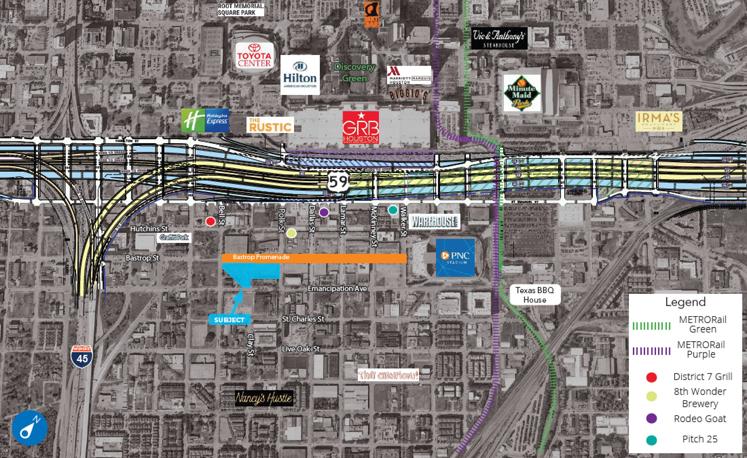 Aerial view of land for sale off Bastrop St in Houston, TX, highlighting nearby commercial tenants and transportation access.