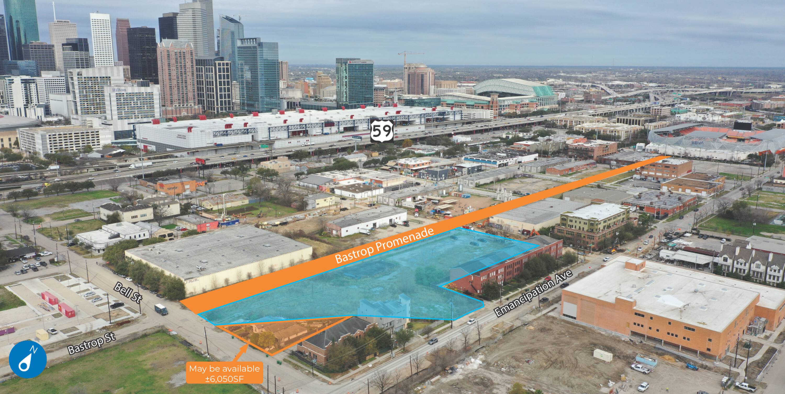 Aerial view of a large vacant land parcel off Bastrop St in Houston, TX, ready for development with clear demarcations and surrounding industrial buildings.