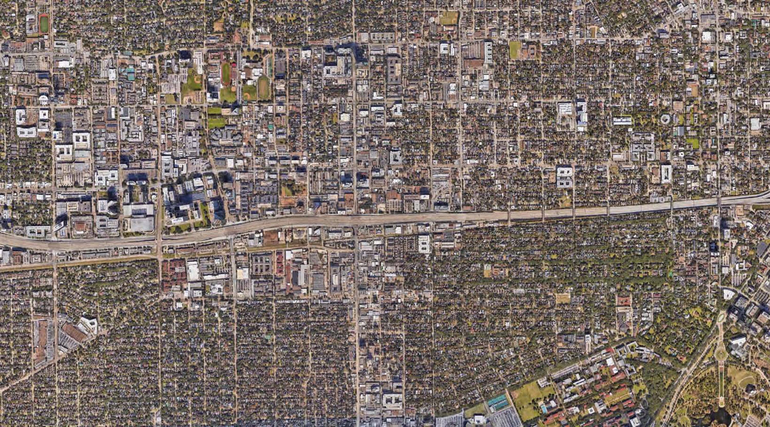 Aerial view of Kipling & Huldy Street property in Houston, TX, showing vacant land with surrounding urban development.