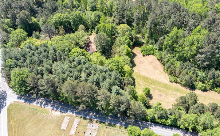 Pictures of Land property located at 3920 Hiram Lithia Springs Rd SW, Powder Springs, GA 30127 for sales - image #1
