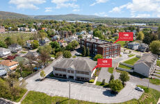 6966085
