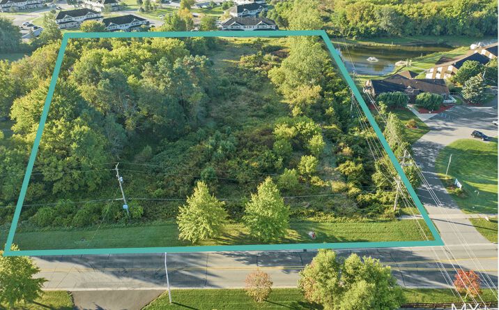 Pictures of Land property located at 568 W Randall St, Coopersville, MI 49404 for sales - image #1