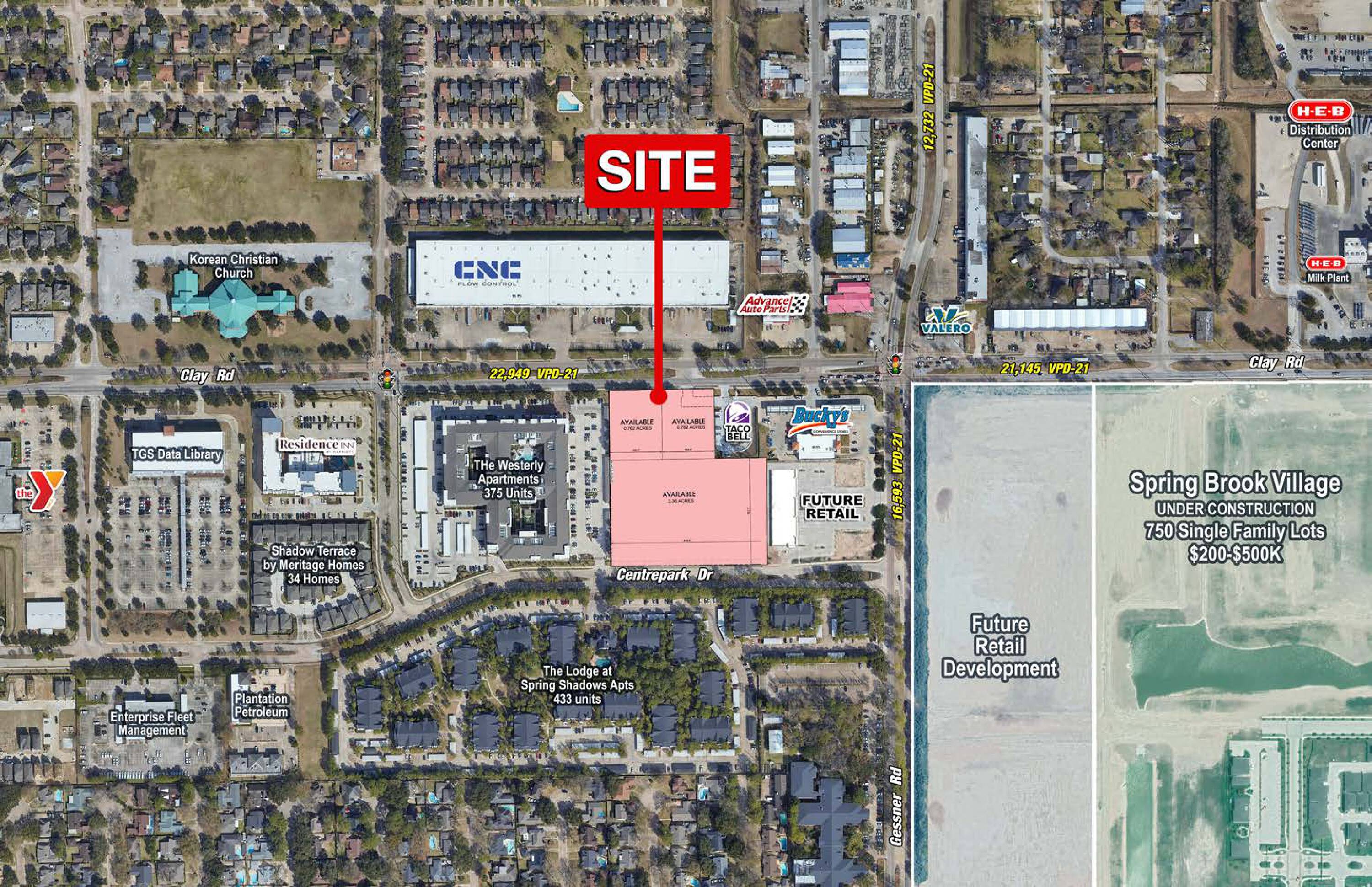 Aerial view of the vacant land at SWC Clay Road & Gessner Road, Houston, TX, with surrounding businesses and developments.