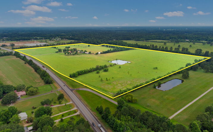 Pictures of Land property located at 14630 TX-105, Cleveland, TX 77327 for sales - image #1