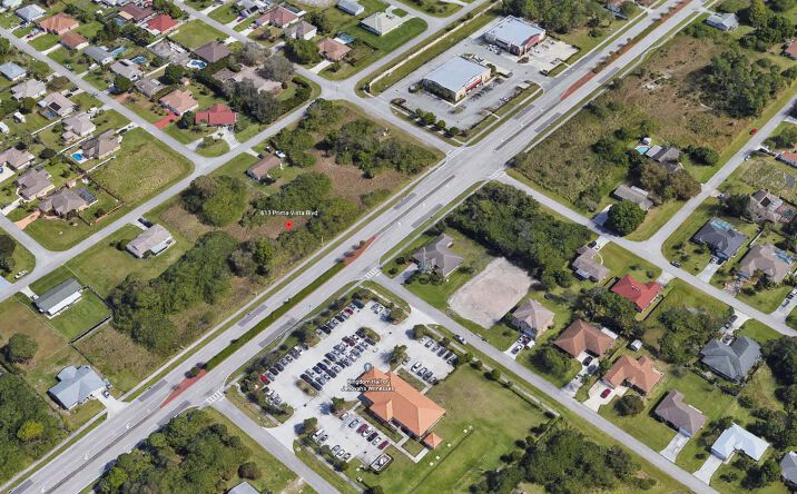 Pictures of Land property located at 609 NW Prima Vista Blvd, Port St. Lucie, FL 34983 for sales - image #1