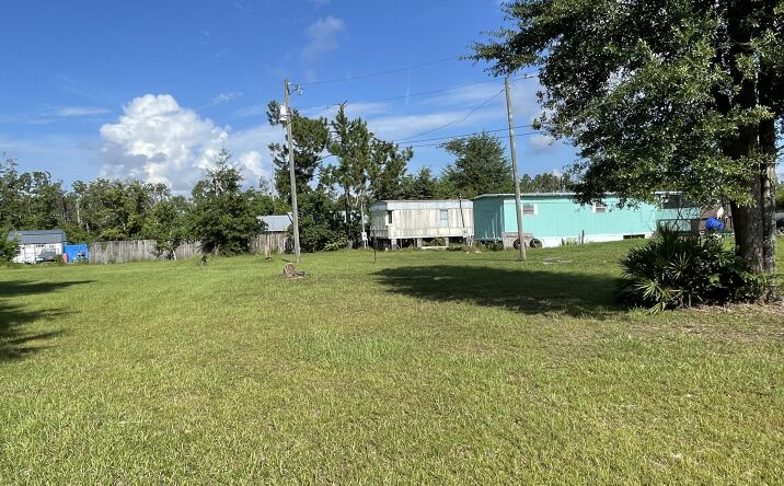 Pictures of Multifamily property located at 8209 Hwy 2301, Youngstown, FL 32466 for sales - image #1