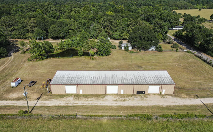 Pictures of Land property located at 14985 Wiggins Rd, Conroe, TX 77302 for sales - image #1