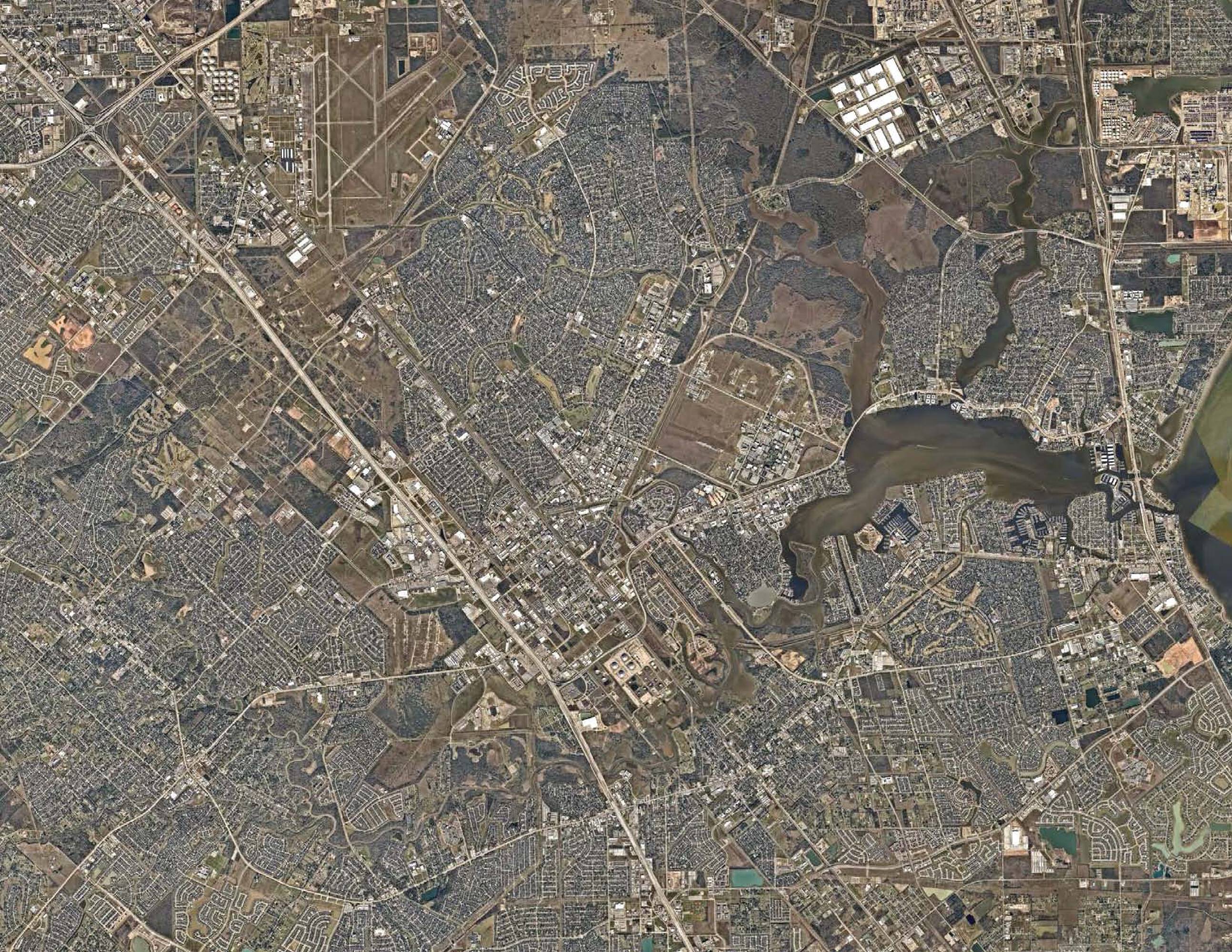Aerial view of the Clear Lake Market property in Houston, TX, showing surrounding neighborhood and amenities.