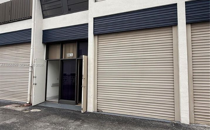 Pictures of Land property located at 12369 SW 132nd Ct # 1 #20-1, Miami, FL 33186 for lease - image #1