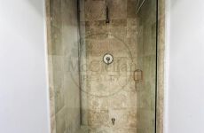 12997680