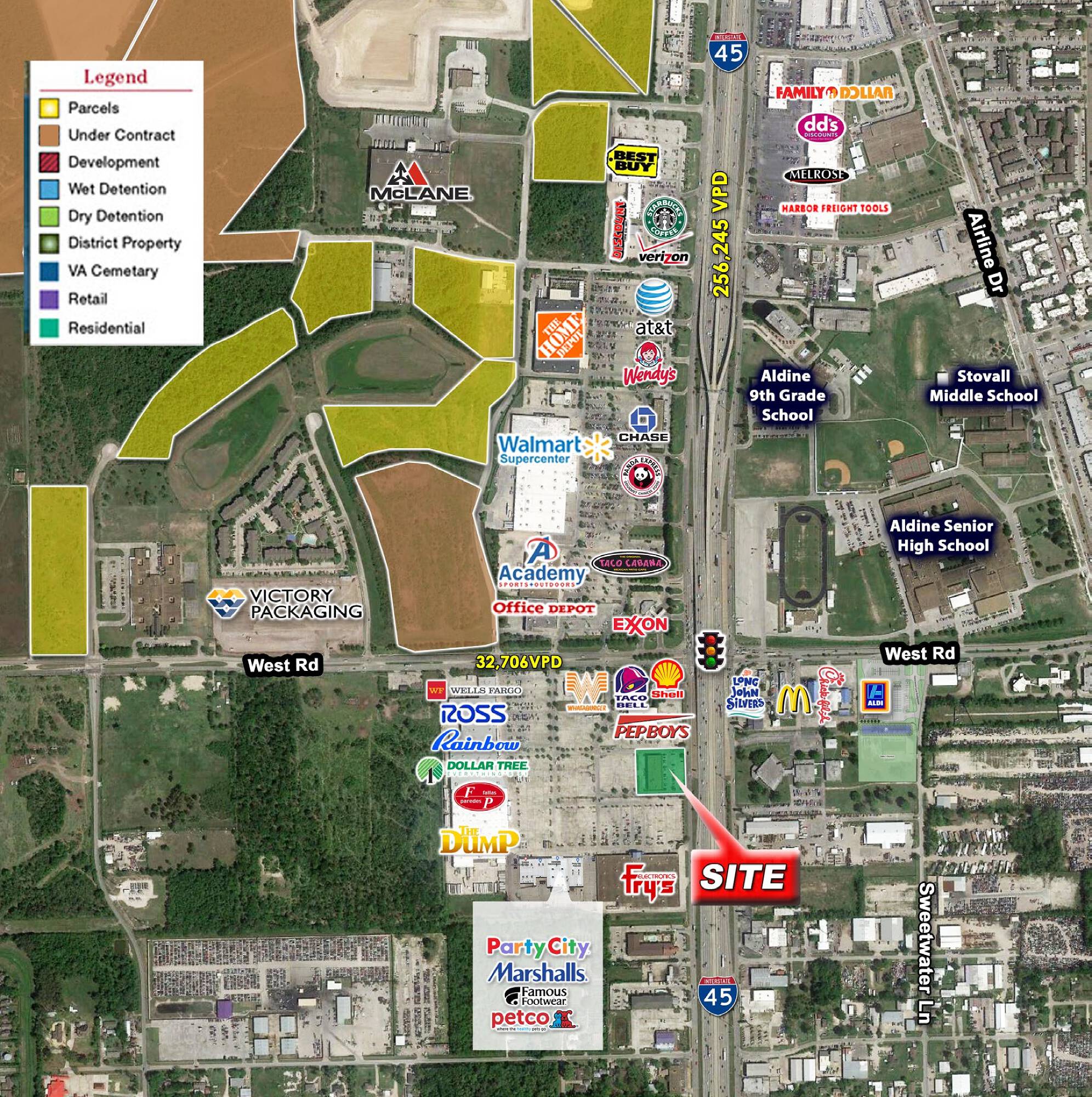 Aerial view of a commercial retail property with surrounding businesses and amenities in a well-developed area.