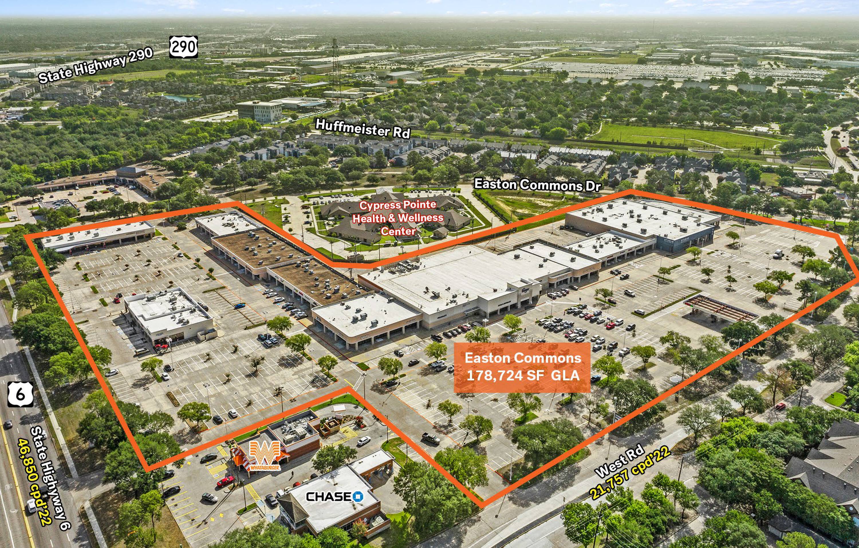 Aerial view of Easton Commons Plaza retail shopping center in Houston, TX with ample parking and multiple retail units.