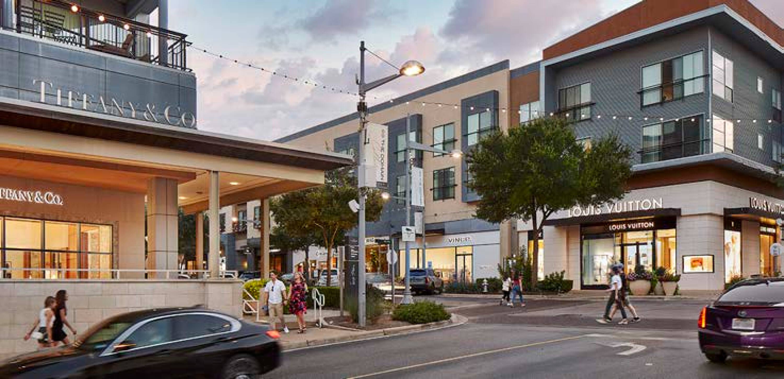 Modern retail development with high-end stores like Tiffany & Co. and Louis Vuitton, featuring ample natural light and pedestrian-friendly walkways.