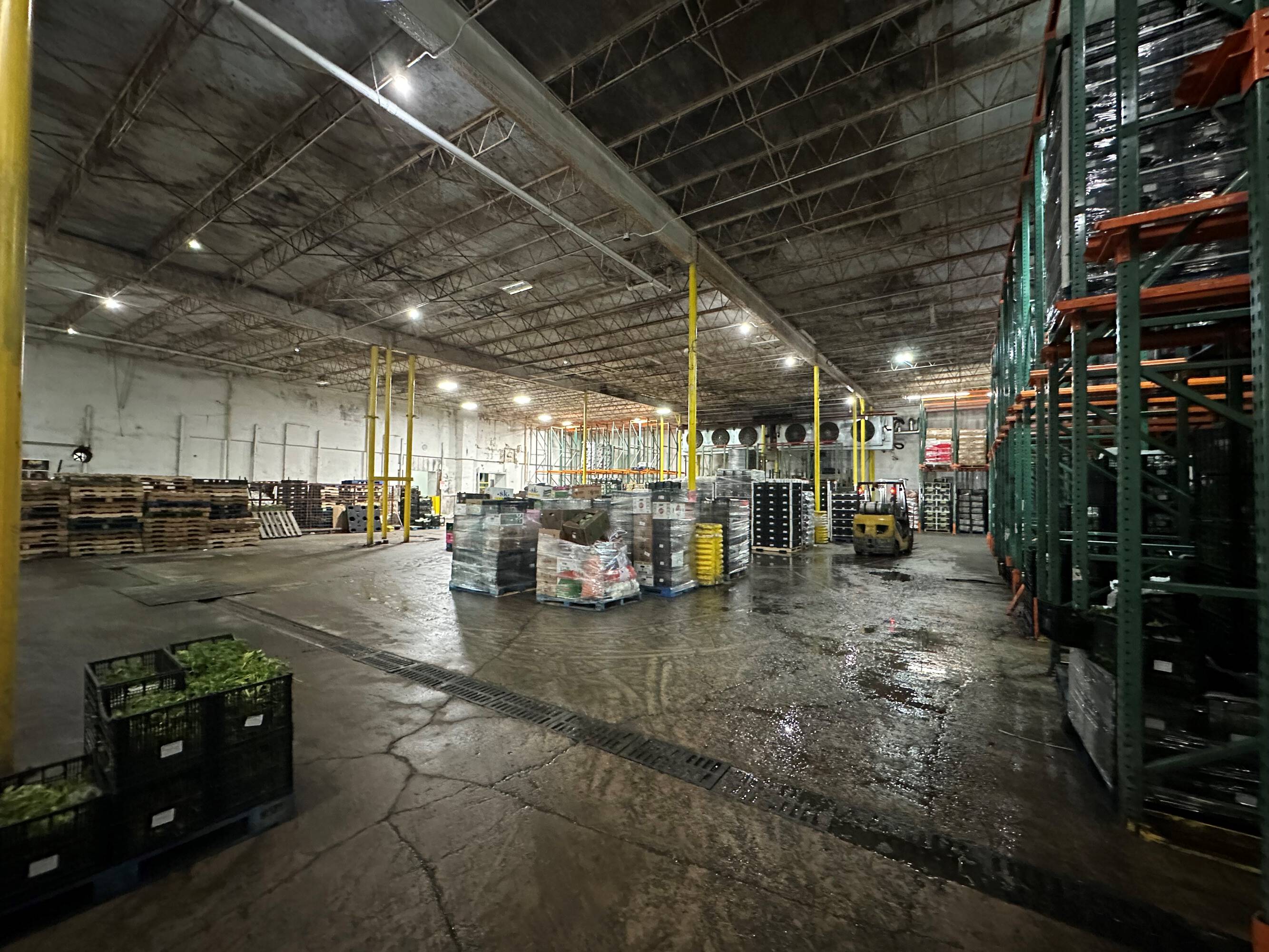 Spacious industrial warehouse with high ceilings, ample lighting, and multiple loading docks at 2216 Silver Street, Houston, TX.