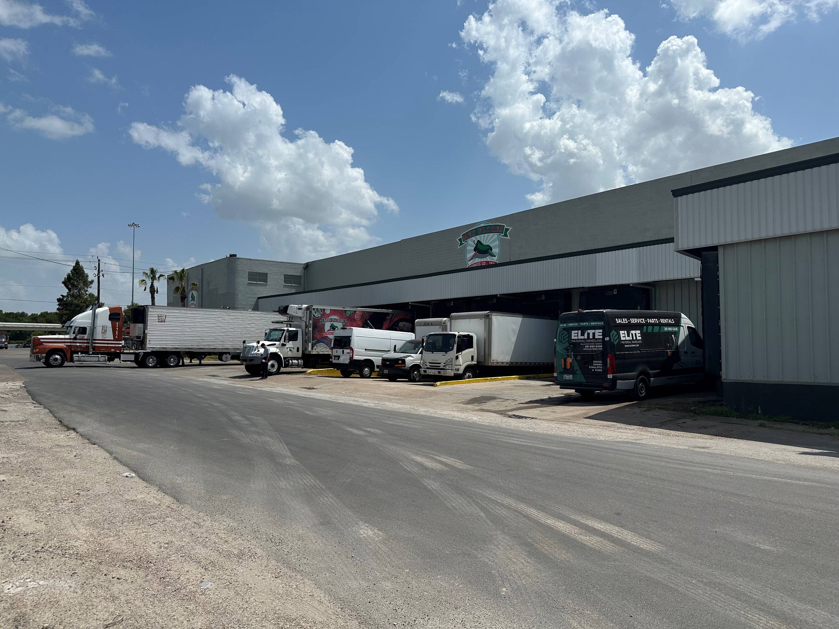 Image of 2216 Silver Street, Houston, TX, showcasing industrial loading docks and parking area.