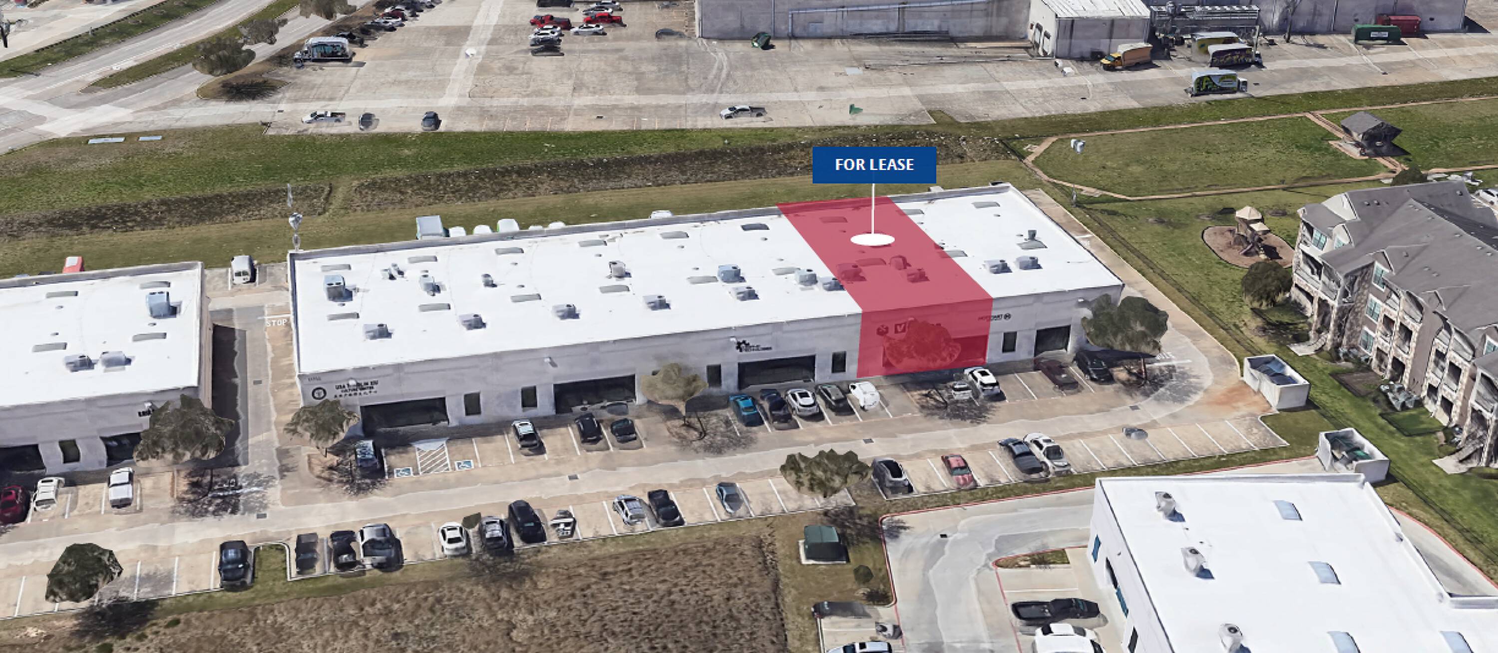 Aerial view of a flex warehouse condo for lease at 21732 Provincial Blvd, Katy, TX, with ample parking and loading areas.
