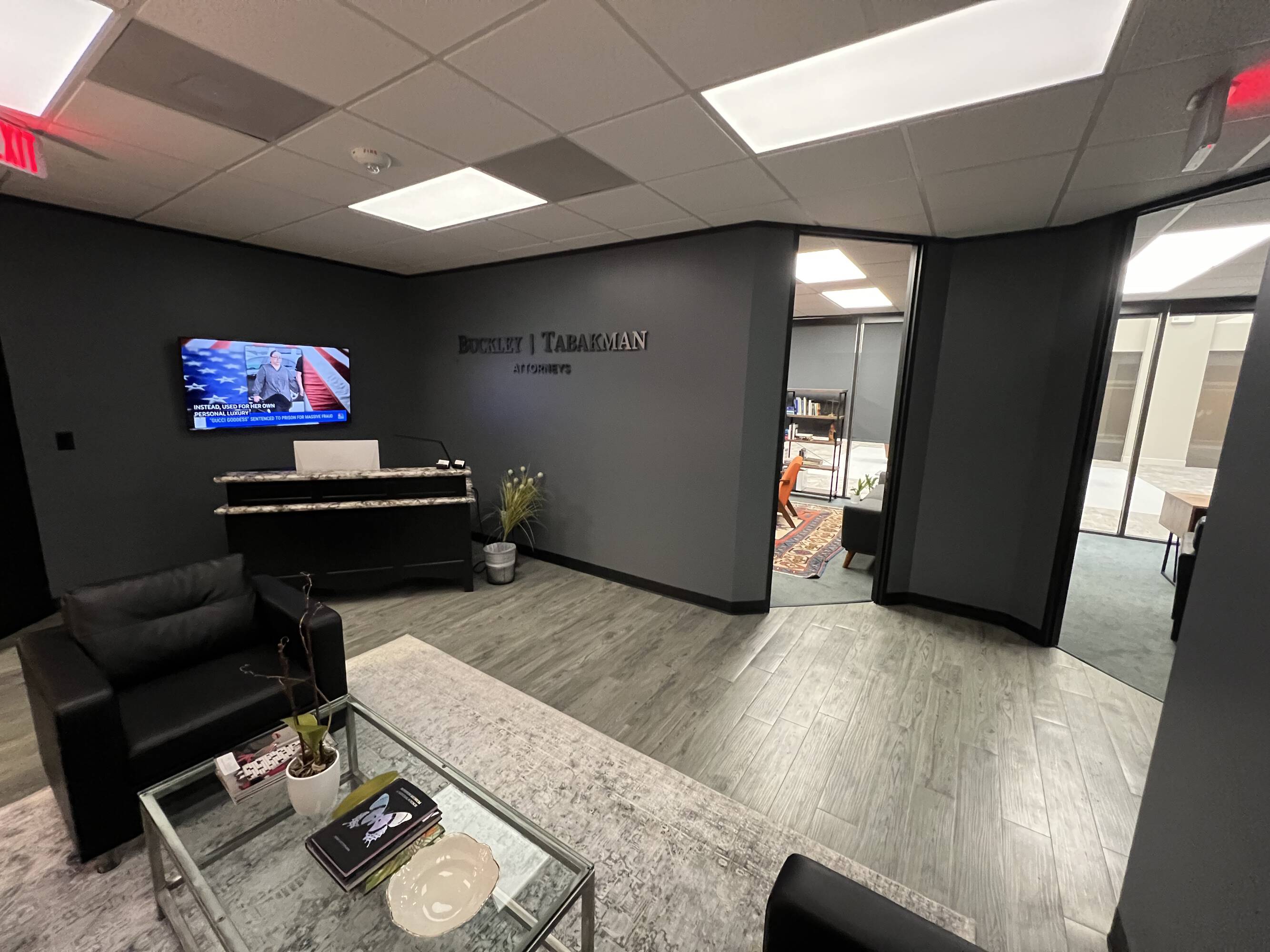 Modern reception area of the Law Office of Sean Buckley at Woodway Center with seating and professional decor.