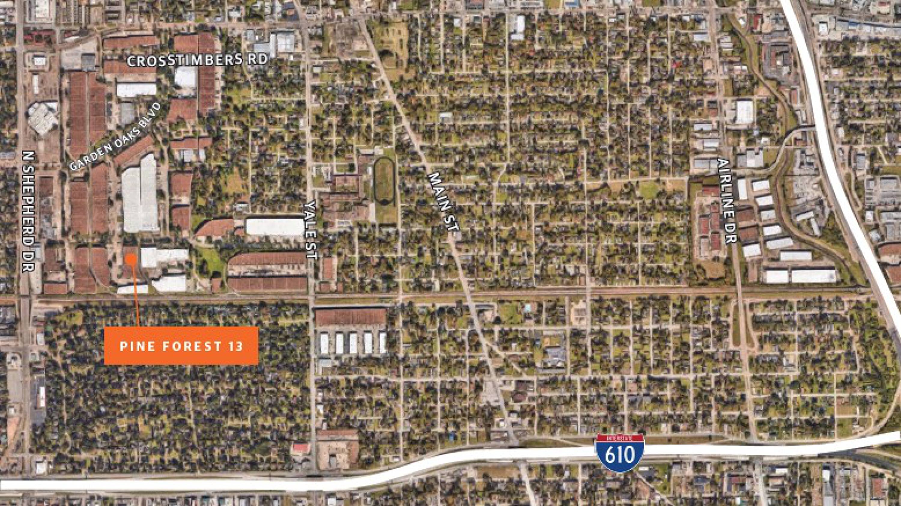 Aerial view of Pine Forest Business Park 13 located at 501 W 38th St, Houston, TX 77018, showing industrial buildings and surrounding infrastructure.