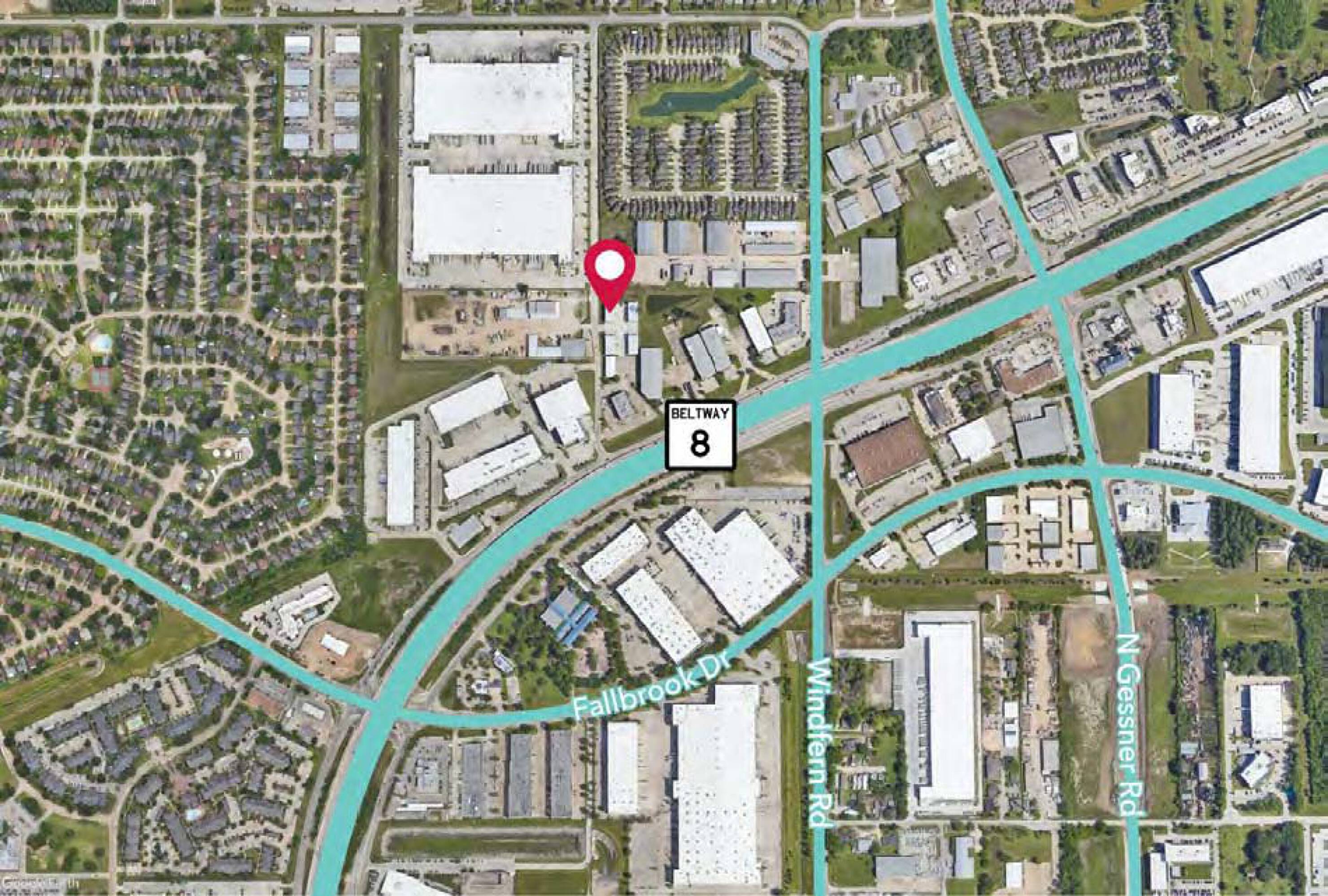 Aerial view of James Place Business Park located at 8466 North Sam Houston Pkwy W, Houston, TX, showing industrial buildings and surrounding infrastructure.