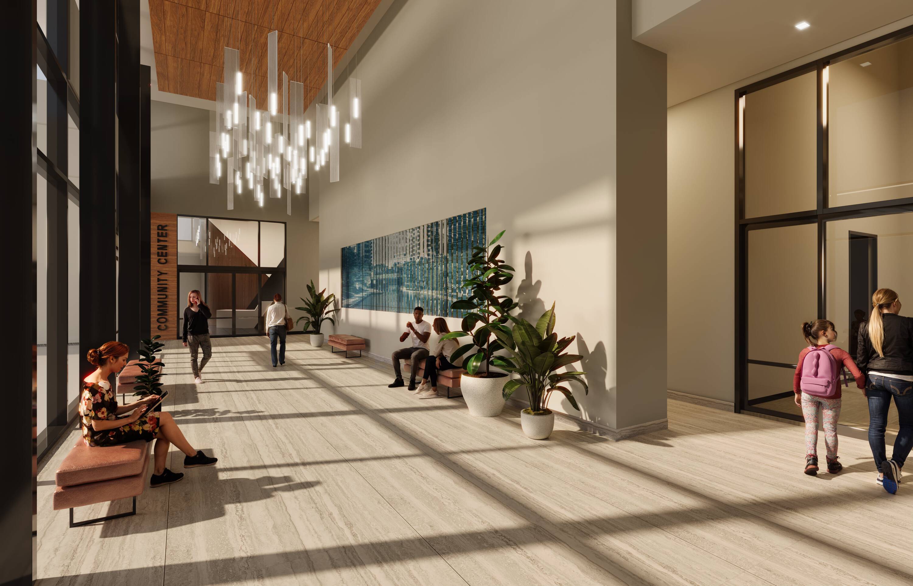 Modern retail lobby with natural light, seating areas, and indoor plants at Grogan's Mill Village Center.