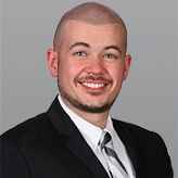 AT