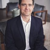 AT